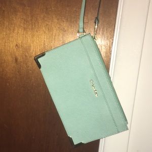 Calvin Klein turquoise clutch